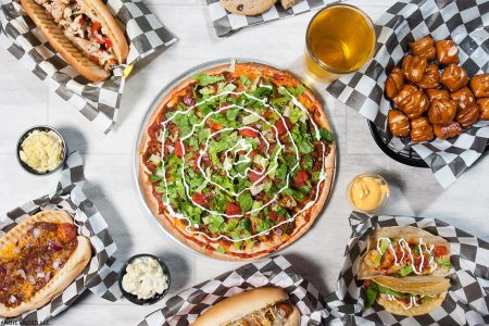 Pizza and Appetizers on a Tabletop